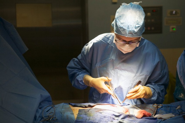 Surgeon working on hernia patient in St. Joseph Hospital